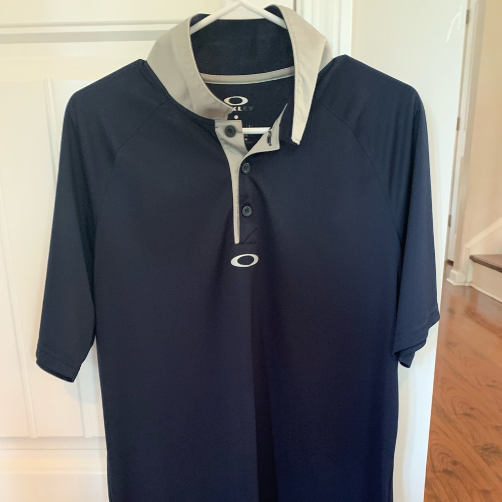 Lot of two Oakley golf polos